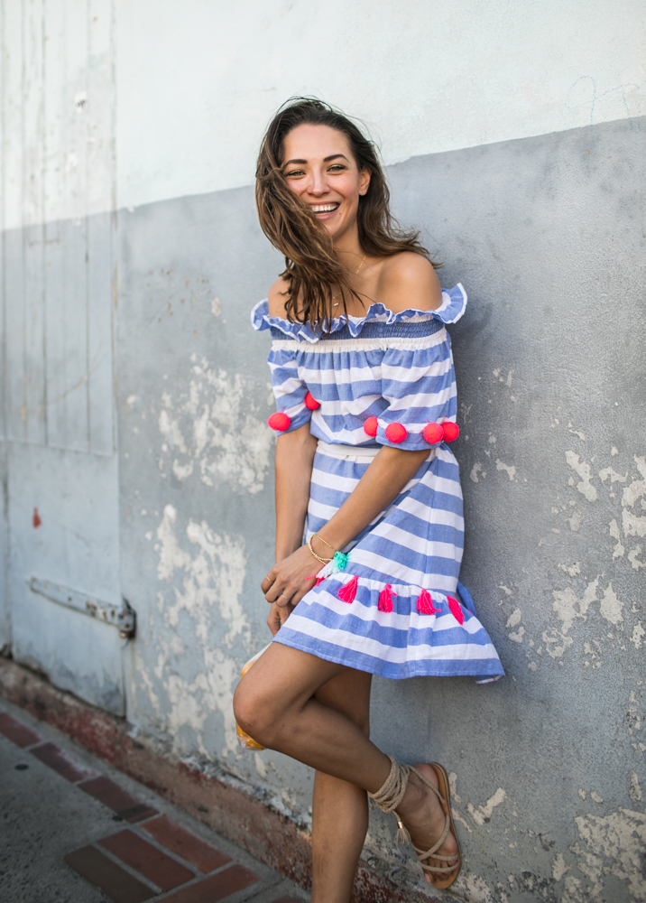 Russian model and blogger Xenia and photographer Samuel Black exploring St Lucia. Xenia wears Sundress official in local fishermen villages.