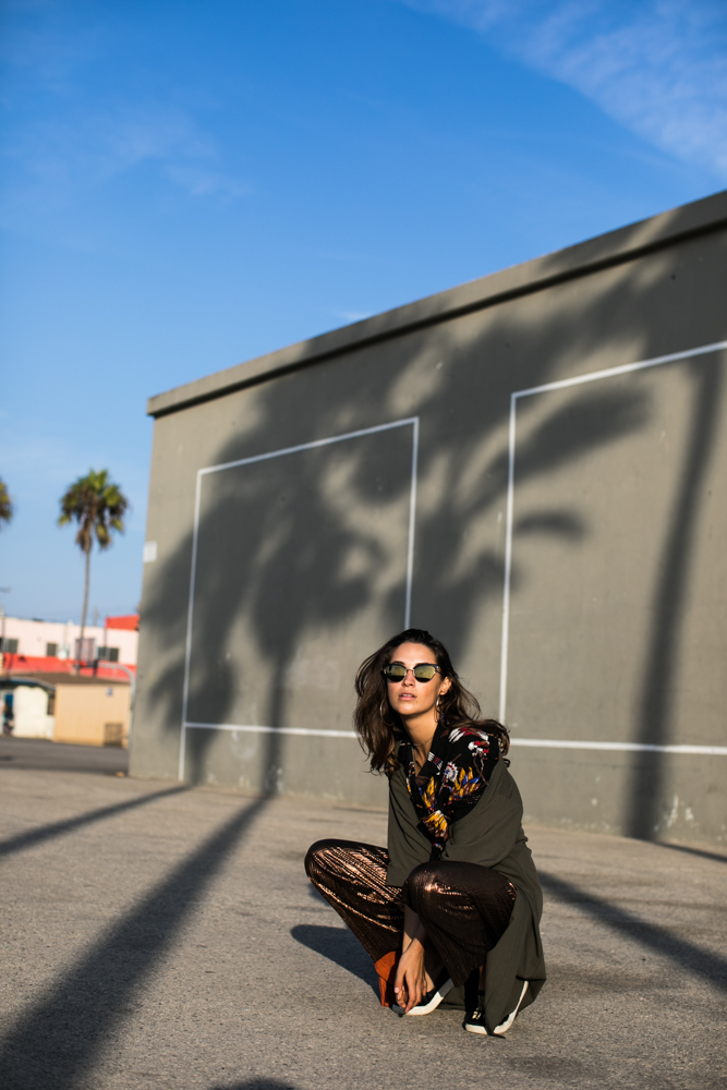 Fashion photographer Samuel Black shoots an editorial with model and streetstyle blogger Xenia Mz in Venice Beach, California